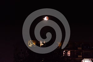 Amsterdam, Netherlands - 07-27-2018 Moon eclips night and illum photo
