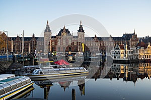 House boats and tourist boats along Signel canal during an early autumn fall morning