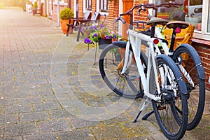 Amsterdam, Netherlands. Two modern bicycles parked