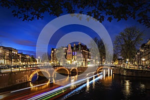 Amsterdam`s canal at night