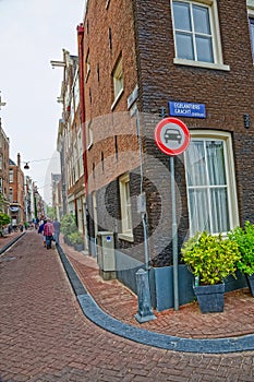 Amsterdam sign of the green zone on the corner of narrow street