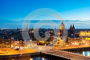 Amsterdam skyline in historical area at night, Netherlands. Ariel view of Amsterdam, Netherlands.