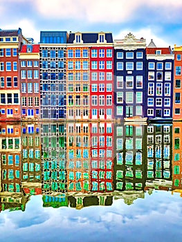 Amsterdam typical dutch houses reflected in the canal Holland, Netherlands