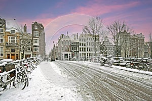 Amsterdam in winter in the Netherlands Europe at sunset