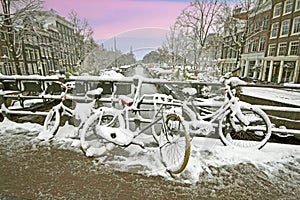 Amsterdam in winter in the Netherlands at sunset