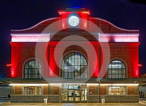 Amtrak Station lit up in red at night for Christmas