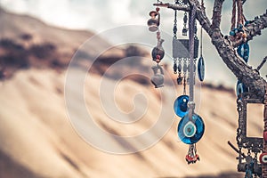 Amulets against evil eye hanging on tree