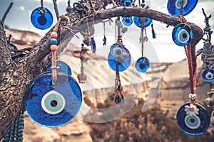 Amulets against evil eye on tree