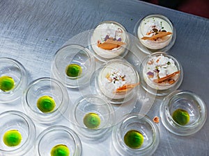 Amuse Bouche Artichoke Foam Desserts on a Kitchen Table