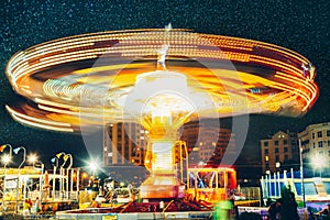 Amusement Park And Carousel At Night, Long Exposure Motion Blur Entertainment Carnival Enjoyment Concept