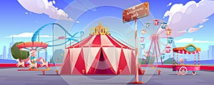 Amusement park with circus tent, ferris wheel photo