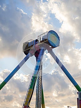 Amusement park. Entertainment concept. Carousel for children and adults. Thrilling sensations