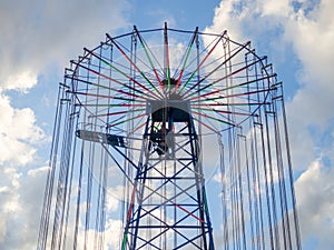 Amusement park. Entertainment concept. Carousel for children and adults. Thrilling sensations