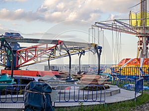 Amusement park. Entertainment concept. Carousel for children and adults. Thrilling sensations