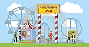 Amusement park entrance with carousles on the background photo