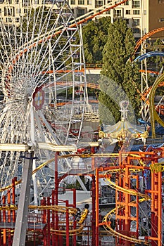 Amusement park. Ferris wheel and roller coaster. Prater. Vienna, Austria
