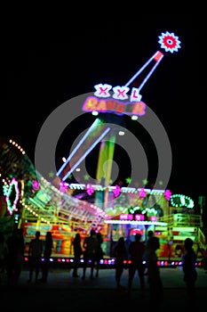 AMUSEMENT PARK at night in bokeh