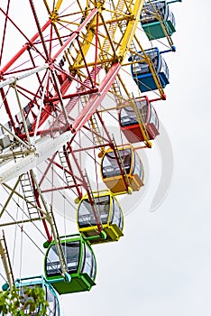 Amusement park observation wheel colored cabs