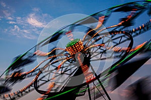 Amusement Rides with Movement Blur at the local County Fair, USA