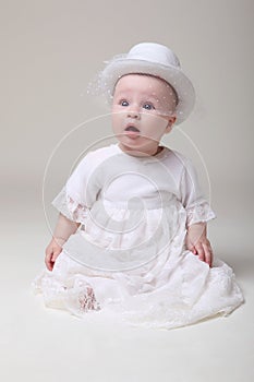 Amusing baby in retro hat photo