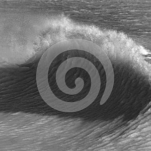 Amzing image of individual wave breaking and cresting during violent windy storm in black and white with superb detail