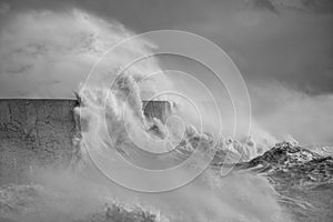 Amzing image of individual wave breaking and cresting during violent windy storm in black and white with superb detail