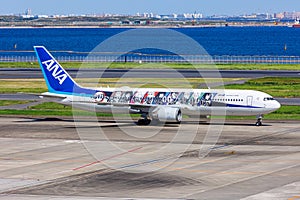 ANA All Nippon Airlines Boeing 767-300ER airplane at Tokyo Haneda Airport in Japan Demon Slayer special livery