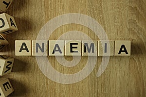 Anaemia word from wooden blocks photo