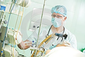 Anaesthesiologist doctor at cardiac operation