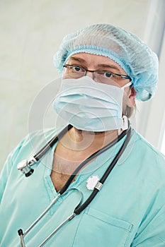 Anaesthesiologist doctor at operation photo