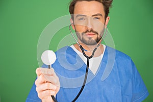 Anaesthetist or doctor holding a stethoscope photo