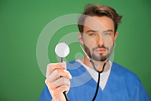 Anaesthetist or doctor holding a stethoscope photo