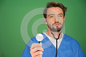 Anaesthetist or doctor holding a stethoscope photo