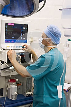 Anaesthetist in operation room photo