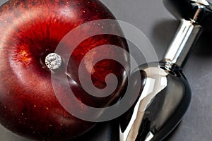 Anal sex concept, anal plug on a black background, butt plug with rhinestone, sex toy photo