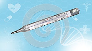 Analog clinical thermometer, mercury free, calibrated in degrees centigrade indicating a temperature of 38.5 degrees centigrade.