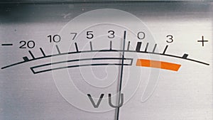 Analog signal indicator with arrow. Meter of the audio signal in decibels.