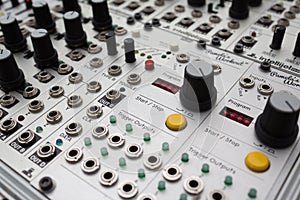 Analog synthesizer , knobs macro on music equipment