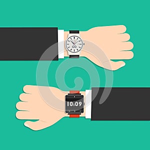 Analog watch and smart watch on businessman's hand