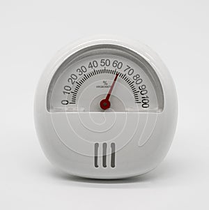 Analogue home thermometer and hygrometer with self-stand isolate