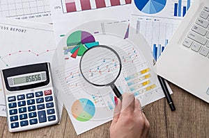 Analysing business graphs with magnifying glass