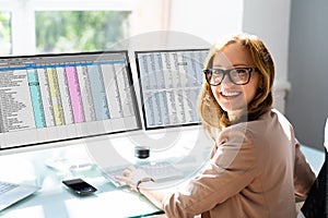 Analyst Employee Working With Spreadsheet photo