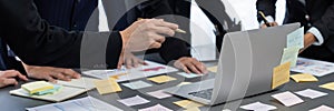 Analyst team use sticky note for financial analyzing. Prodigy