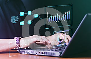 Analyst working with Business Analytics and Data Management System on computer, make a report with KPI and metrics connected to