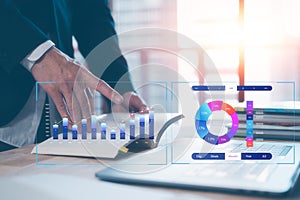 Analyst working with Business Analytics and Data Management System on computer,
