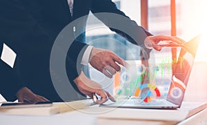 Analyst working with Business Analytics and Data Management System
