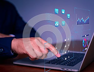 Analyst working with business analytics and data management system on computer, make a report with KPI and metrics connected to