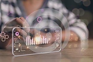 Analyst working with Business Analytics and Data Management System on computer to make report with KPI and metrics connected to
