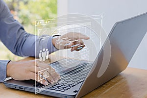 Analyst working with computer in Business Analytics and Data Management System to make report with KPI and metrics connected