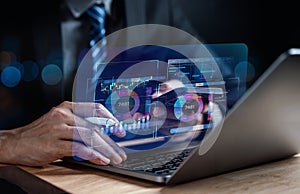 Analyst working with computer in Business Analytics and Data Management System to make report with KPI and metrics connected to